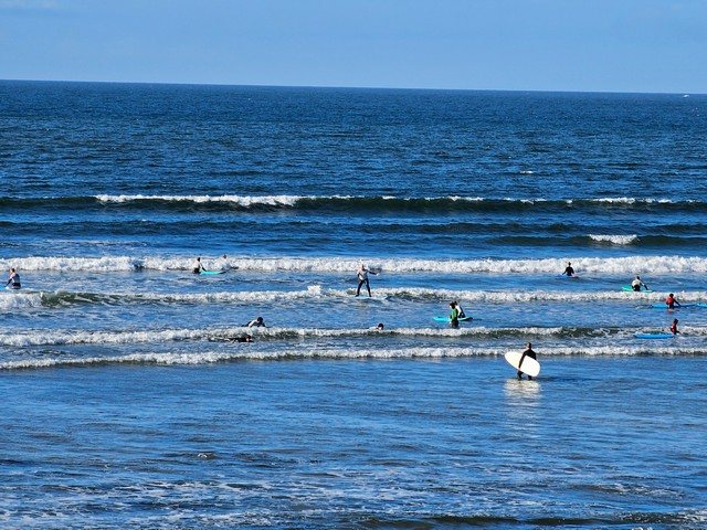 Lots of junior surfers in the water training with the local surf club small waves ideal for those starting off their surfing journey